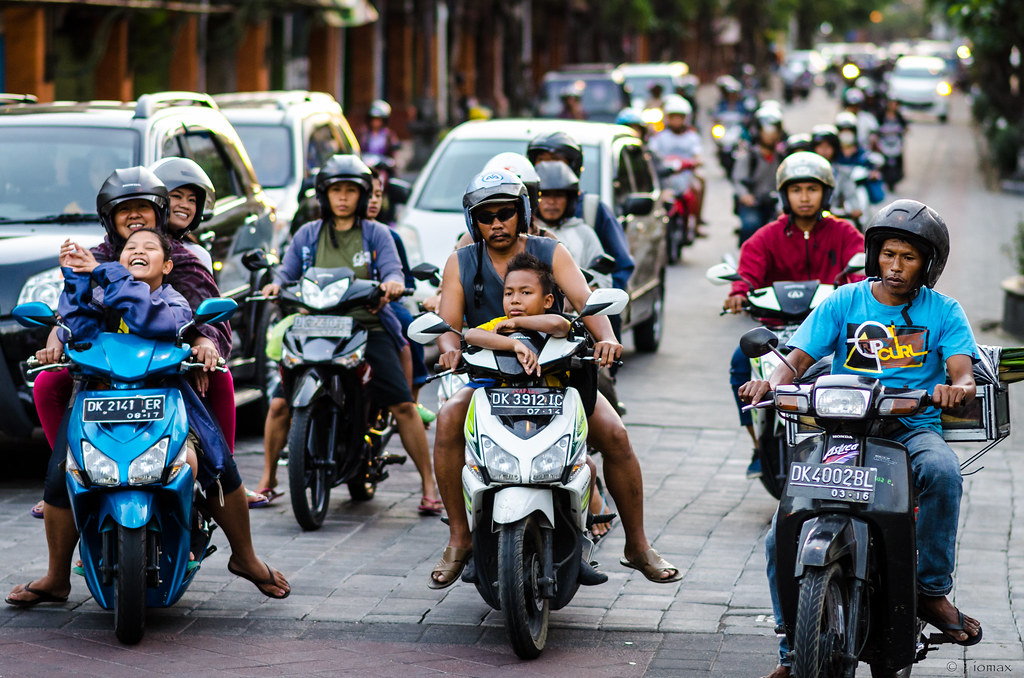 Riding scooters on scenic Bali roads
